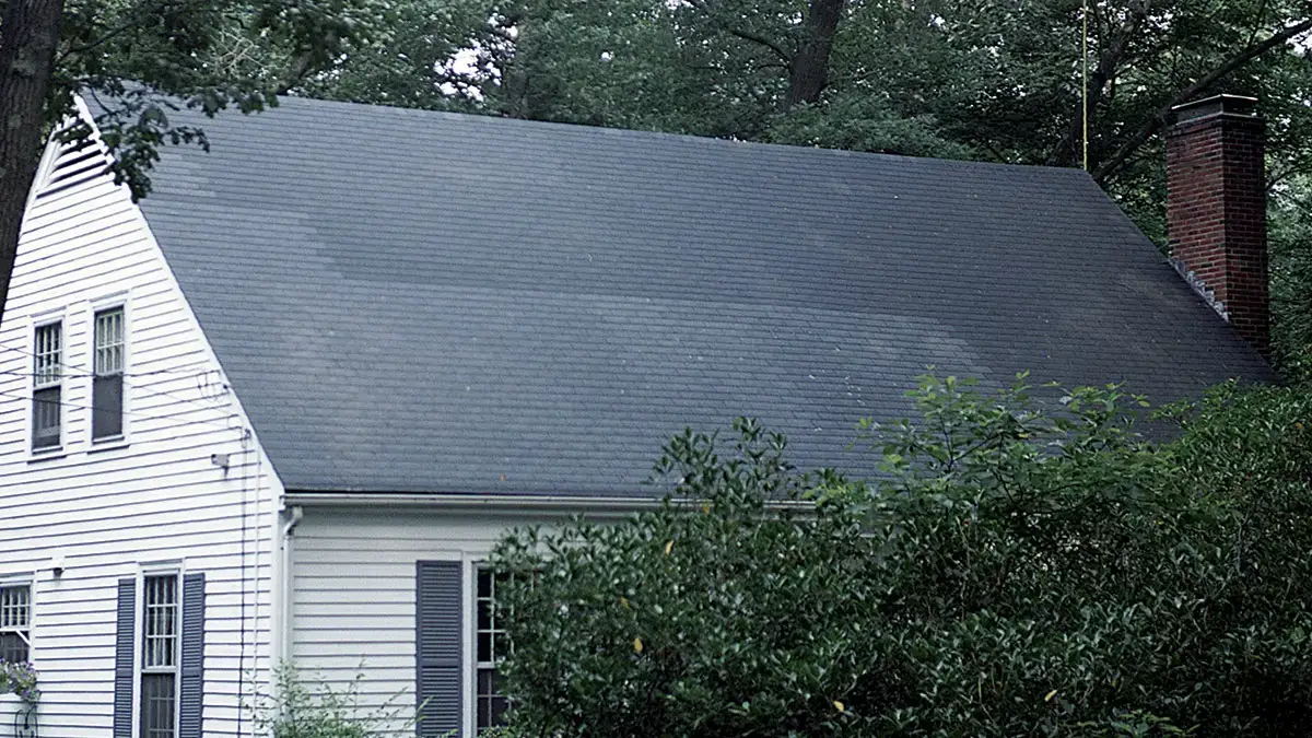 This photo shows the lack of matching between 2 areas of the roof, and reflects the need to replace the full roof.