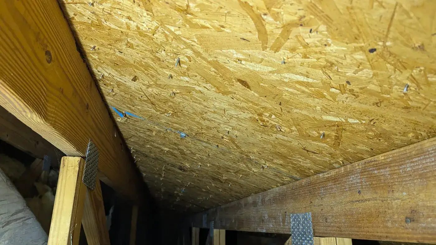 Roof decking and framing inspected after water intrusion